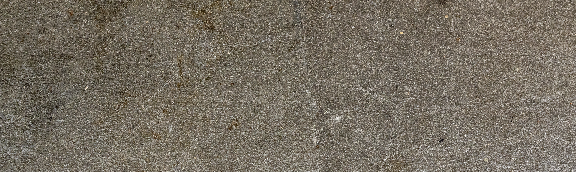 Nahaufnahme einer leeren grauen Betonfläche als neutraler Hintergrund. | © Gabor Shoes GmbH, Rosenheim