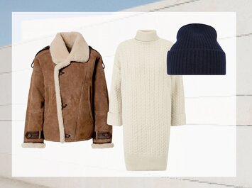 En brun lammskinnjacka, en vit stickad klänning med polokrage och en mörkblå stickad mössa är arrangerade bredvid varandra mot en ljus bakgrund. | © aboutyou.de 